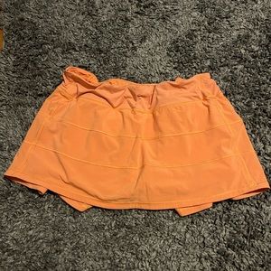 Orange lulu tennis skirt